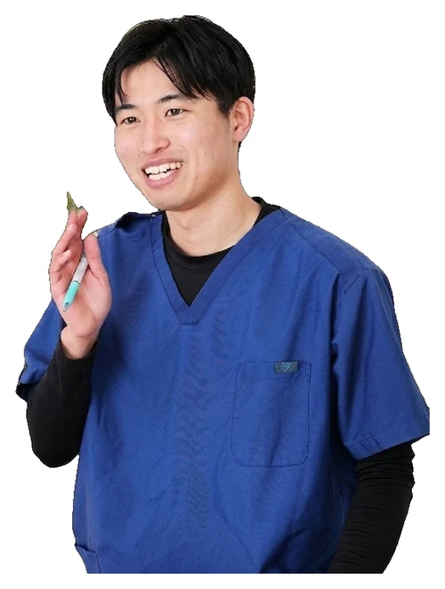 笑顔で説明する施術師